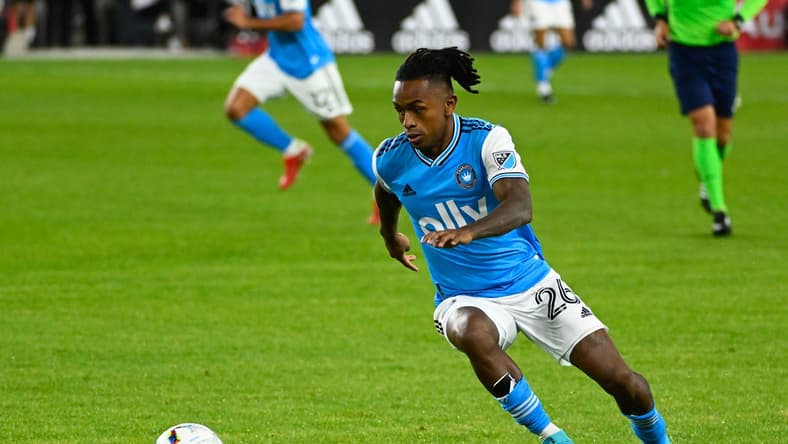 Feb 26, 2022; Washington, District of Columbia, USA; Charlotte FC forward Yordy Reyna (26) controls the ball against the D.C. United during the game at Audi Field. Mandatory Credit: Brad Mills-USA TODAY Sports