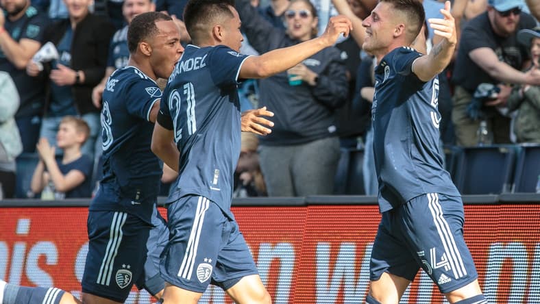 Mar 5, 2022; Kansas City, Kansas, USA; Sporting Kansas City midfielder Remi Walter (54) celebrates after scoring a goal during the second half against the Houston Dynamo at Children's Mercy Park. Mandatory Credit: William Purnell-USA TODAY Sports