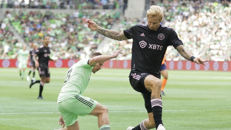 Mar 6, 2022; Austin, Texas, USA; Austin FC midfielder Alexander Ring (8) battles for the ball with Inter Miami midfielder Brek Shea (20) in the first half of a MLS game at Q2 Stadium. Mandatory Credit: Erich Schlegel-USA TODAY Sports