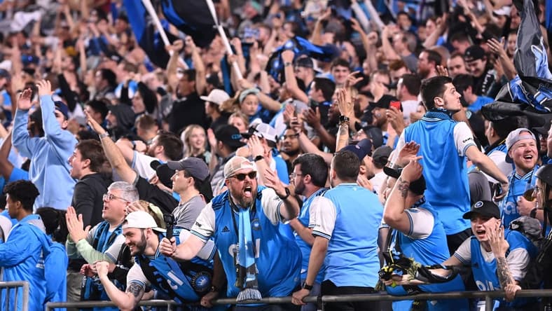 Mar 5, 2022; Charlotte, North Carolina, USA; Charlotte FC fans cheer in the second half at Bank of America Stadium. Mandatory Credit: Bob Donnan-USA TODAY Sports