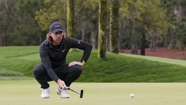 Mar 10, 2022; Ponte Vedra Beach, Florida, USA; Tommy Fleetwood lines up a putt during the first round of THE PLAYERS Championship golf tournament. Mandatory Credit: David Yeazell-USA TODAY Sports