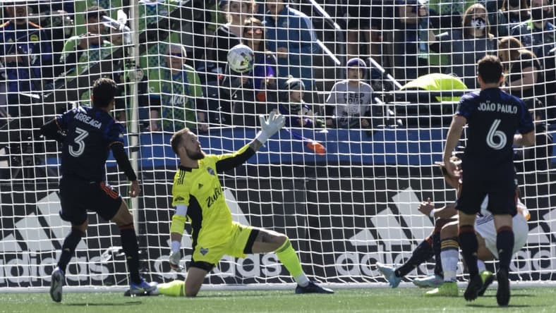 Mar 12, 2022; Seattle, Washington, USA; Seattle Sounders FC goalkeeper Stefan Frei (24) cannot get to a shot by LA Galaxy forward Chichirito (14) during the first half at Lumen Field. Mandatory Credit: Stephen Brashear-USA TODAY Sports