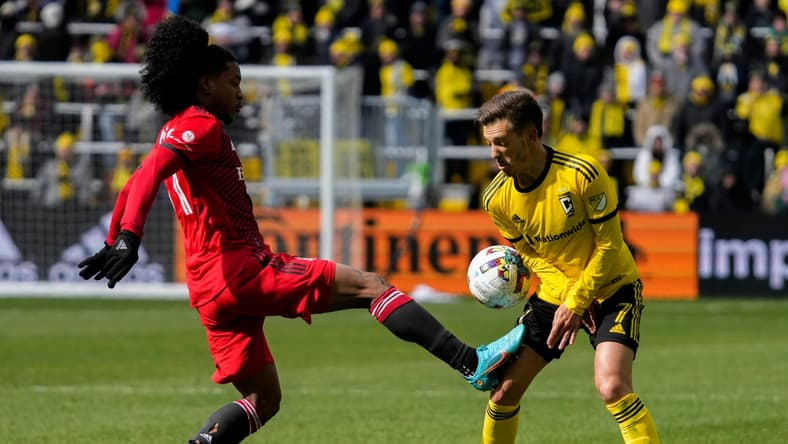 Sat., Mar. 12, 2022; Columbus, Ohio, USA; Toronto FC forward Jayden Nelson (11) hits Columbus Crew forward Pedro Santos (7) in the thigh while fighting for the ball during the second half of a MLS game between the Columbus Crew and Toronto FC at Lower.com Field.

Mls Toronto Fc At Columbus Crew