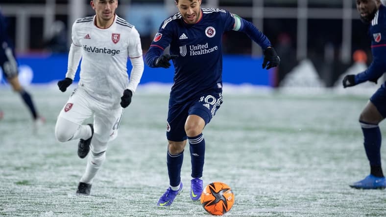 Mar 12, 2022; Foxborough, Massachusetts, USA; New England Revolution midfielder Carles Gil (10) possesses the ball during the second half against Real Salt Lake at Gillette Stadium. Mandatory Credit: Paul Rutherford-USA TODAY Sports