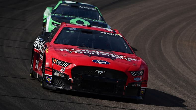 Mar 13, 2022; Avondale, Arizona, USA; NASCAR Cup Series driver Chase Briscoe (14) drives ahead of driver Austin Dillon (3) during the Ruoff Mortgage 500 at Phoenix Raceway. Mandatory Credit: Gary A. Vasquez-USA TODAY Sports