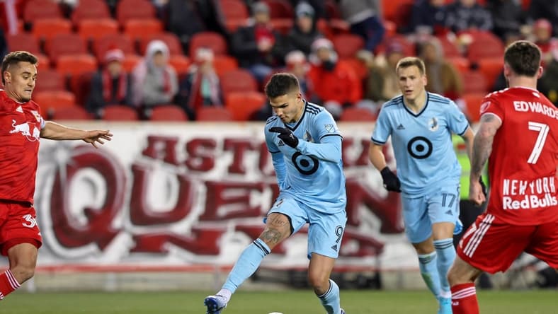 Mar 13, 2022; Harrison, New Jersey, USA; Minnesota United forward Luis Amarilla (9) dribbles the ball against the New York Red Bulls during the first half at Red Bull Arena. Mandatory Credit: Vincent Carchietta-USA TODAY Sports