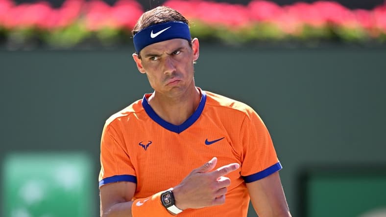 Mar 16, 2022; Indian Wells, CA, USA; Rafael Nadal (ESP) questions a line call during his fourth round match against Reilly Opelka (USA) in the fourth round at the BNP Paribas Open at the Indian Wells Tennis Garden. Mandatory Credit: Jayne Kamin-Oncea-USA TODAY Sports
