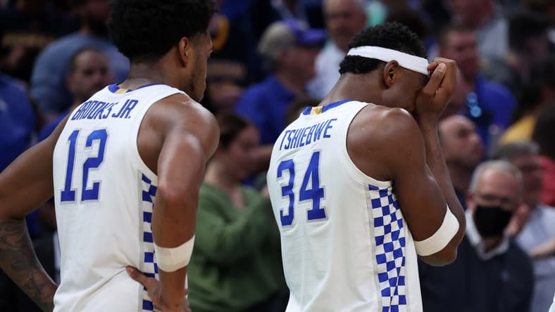 Mar 17, 2022; Indianapolis, IN, USA; Kentucky Wildcats forward Oscar Tshiebwe (34) reacts after losing to the Saint Peter's Peacocks during the first round of the 2022 NCAA Tournament at Gainbridge Fieldhouse. Mandatory Credit: Trevor Ruszkowski-USA TODAY Sports