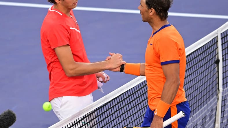 Mar 20, 2022; Indian Wells, CA, USA; Taylor Fritz (USA) shakes hands with Rafael Nadal (ESP) after winning the men's final at the BNP Paribas Open at the Indian Wells Tennis Garden. Mandatory Credit: Jayne Kamin-Oncea-USA TODAY Sports