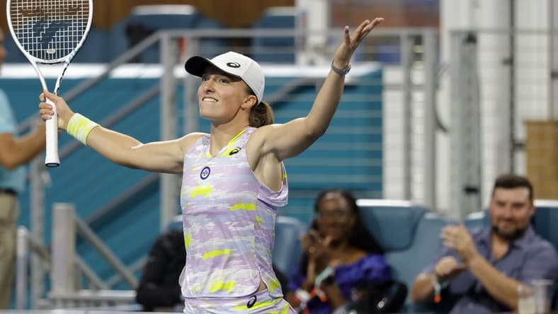 Mar 25, 2022; Miami Gardens, FL, USA; Iga Swiatek (POL) celebrates after her match against Victorija Golubic (SUI) (not pictured) in a second round women's singles match in the Miami Open at Hard Rock Stadium. Mandatory Credit: Geoff Burke-USA TODAY Sports