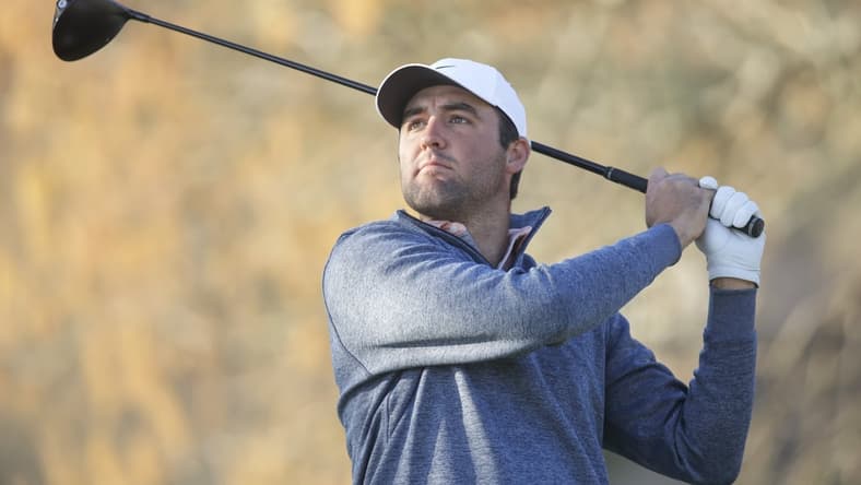 Mar 26, 2022; Austin, Texas, USA; Scottie Scheffler tees off on the 6th hole during the fourth round of the World Golf Championships-Dell Technologies Match Play golf tournament. Mandatory Credit: Erich Schlegel-USA TODAY Sports