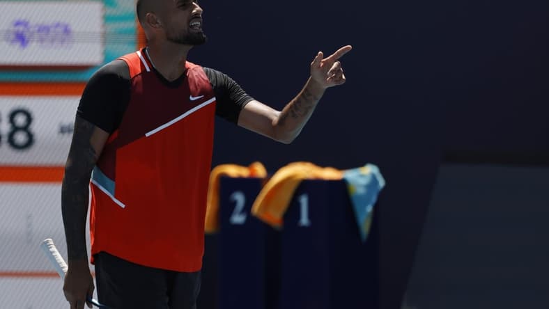 Mar 29, 2022; Miami Gardens, FL, USA; Nick Kyrgios (AUS) argues with chair umpire Carlos Bernardes (not pictured) after being assessed a point penalty during the first set tiebreaker against Jannik Sinner (ITA)(not pictured) in a fourth round men's singles match in the Miami Open at Hard Rock Stadium. Mandatory Credit: Geoff Burke-USA TODAY Sports
