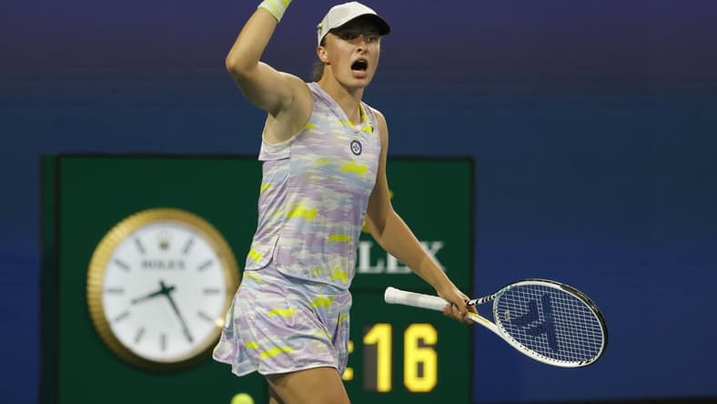 Mar 30, 2022; Miami Gardens, FL, USA; Iga Swiatek (POL) celebrates after match point against Petra Kvitova (CZE)(not pictured) in a women's singles quarterfinal match in the Miami Open at Hard Rock Stadium. Mandatory Credit: Geoff Burke-USA TODAY Sports