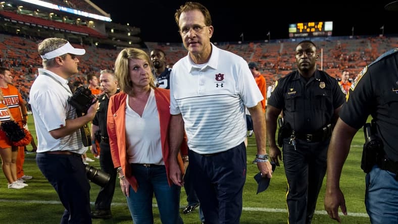 Auburn head coach Gus Malzahn and his wife, Kristi, walk of the field at Jordan-Hare Stadium in Auburn, Ala., on Saturday, Sept. 28, 2019. Auburn defeated Mississippi State 56-23.

Jc Auburnmissstate 73