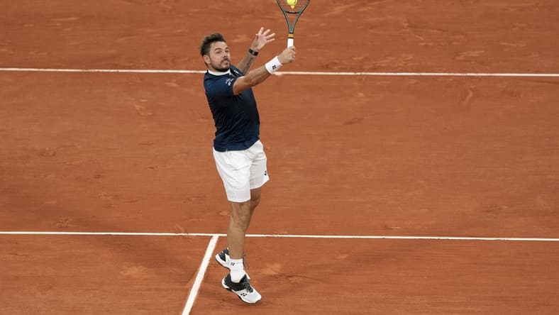 Sep 27, 2020; Paris, France; Stanislas Wawrinka (SUI) in action during his match against Andy Murray (GBR) on day one at Stade Roland Garros. Mandatory Credit: Susan Mullane-USA TODAY Sports