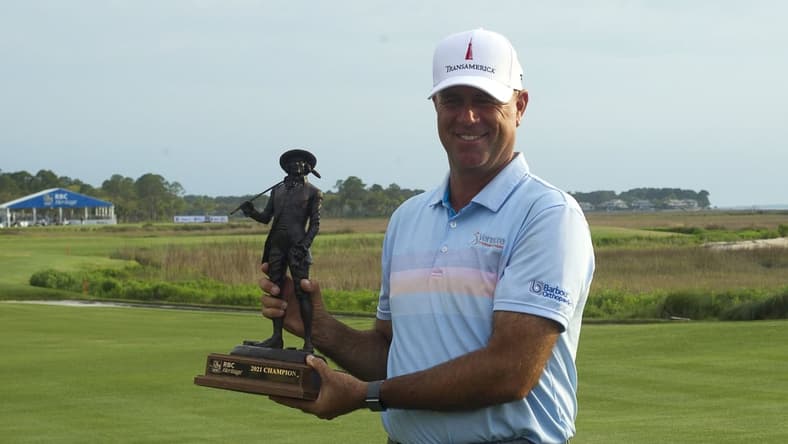 Apr 18, 2021; Hilton Head, South Carolina, USA; Stewart Cink poses with the trophy after winning the 2021 RBC Heritage golf tournament. Mandatory Credit: Joshua S. Kelly-USA TODAY Sports
