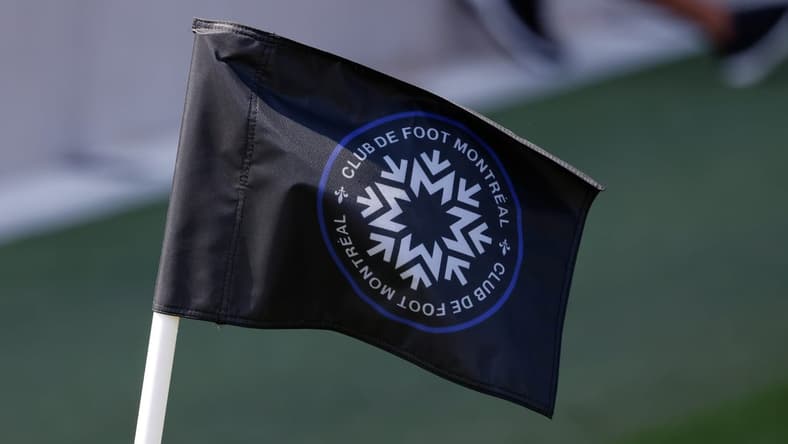 Apr 17, 2021; Fort Lauderdale, FL, Fort Lauderdale, FL, USA; A detailed view of a corner flag with the logo of CF Montreal on the pitch during the second half between CF Montreal and Toronto FC at DRV PNK Stadium. Mandatory Credit: Rhona Wise-USA TODAY Sports