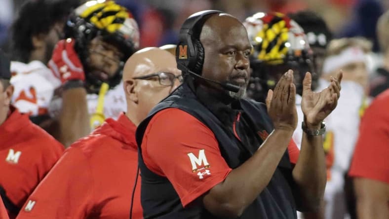 Sep 17, 2021; Champaign, Illinois, USA; Maryland Terrapins head coach Mike Locksley looks on from the sideline against the Illinois fighting Illini at Memorial Stadium. Mandatory Credit: Ron Johnson-USA TODAY Sports