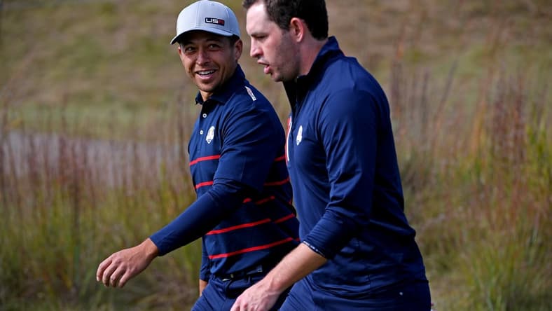 Sep 24, 2021; Haven, Wisconsin, USA; Team USA player Xander Schauffele and Team USA player Patrick Cantlay on the 15th hole during day one four ball matches for the 43rd Ryder Cup golf competition at Whistling Straits. Mandatory Credit: Orlando Ramirez-USA TODAY Sports