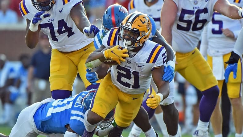 Oct 23, 2021; Oxford, Mississippi, USA; LSU Tigers running back Corey Kiner (21) carries the ball during the second half against the Mississippi Rebels at Vaught-Hemingway Stadium. Mandatory Credit: Justin Ford-USA TODAY Sports
