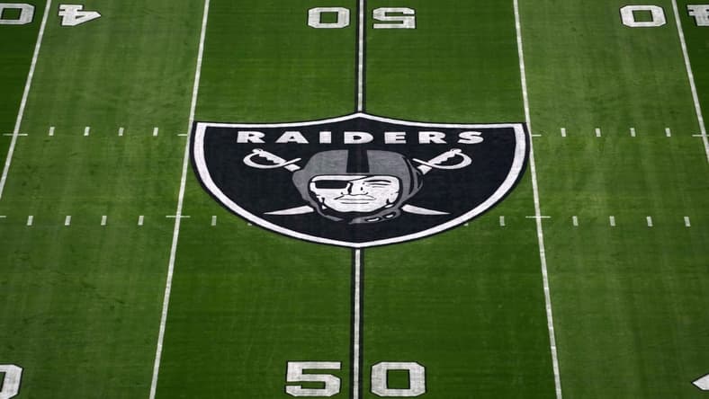 Nov 14, 2021; Paradise, Nevada, USA; A detailed view of the Las Vegas Raiders shield logo at midfield at Allegiant Stadium. Mandatory Credit: Kirby Lee-USA TODAY Sports