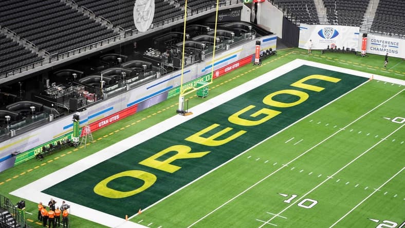 Dec 3, 2021; Las Vegas, NV, USA; A detailed view of the Oregon Ducks logo in the end zone at Allegiant Stadium before the 2021 Pac-12 Championship Game between Oregon and the Utah Utes. Mandatory Credit: Kirby Lee-USA TODAY Sports