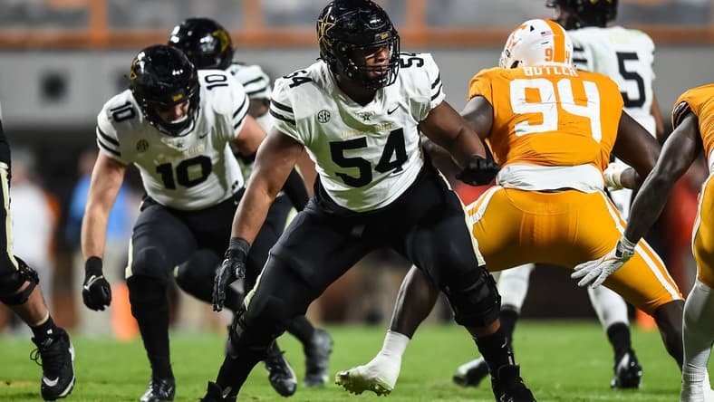 Nov 27, 2021; Knoxville, Tennessee, USA; Vanderbilt Commodores offensive lineman Tyler Steen (54) blocks during the second half against the Tennessee Volunteers at Neyland Stadium. Mandatory Credit: Bryan Lynn-USA TODAY Sports
