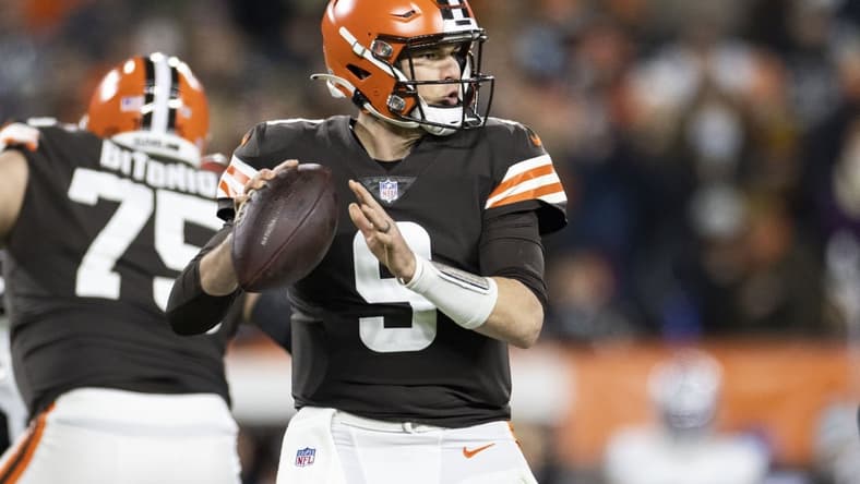 Dec 20, 2021; Cleveland, Ohio, USA; Cleveland Browns quarterback Nick Mullens (9) looks for an available receiver against the Las Vegas Raiders during the second quarter at FirstEnergy Stadium. Mandatory Credit: Scott Galvin-USA TODAY Sports