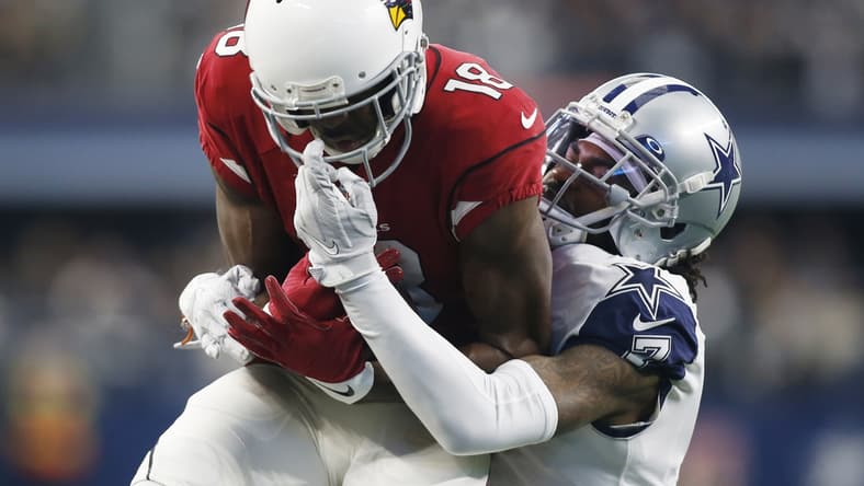 Jan 2, 2022; Arlington, Texas, USA; Arizona Cardinals wide receiver A.J. Green (18) catches a pass against Dallas Cowboys cornerback Trevon Diggs (7) in the first quarter at AT&T Stadium. Mandatory Credit: Tim Heitman-USA TODAY Sports