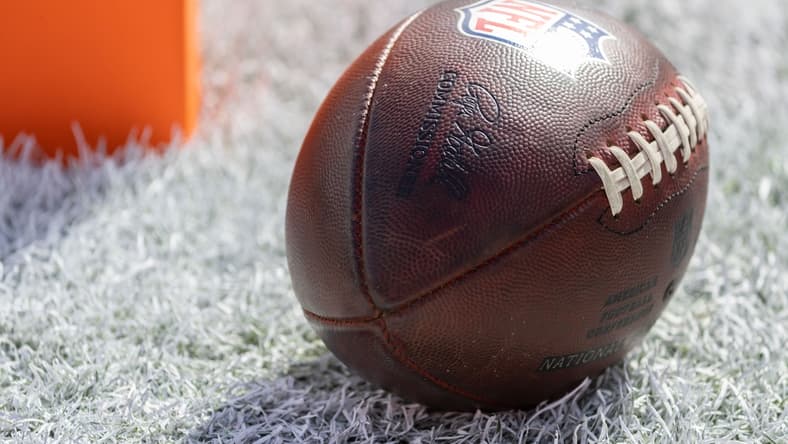 Jan 23, 2022; Tampa, Florida, USA; An official NFL football sits in the endzone before the game between the Tampa Bay Buccaneers and the Los Angeles Rams during a NFC Divisional playoff football game at Raymond James Stadium. Mandatory Credit: Matt Pendleton-USA TODAY Sports