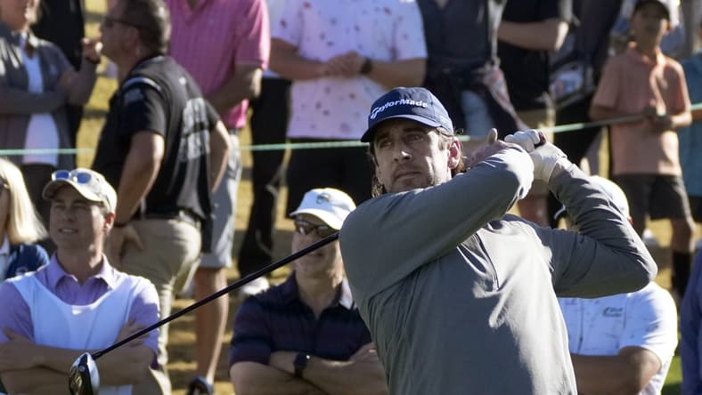 Feb 9, 2022; Scottsdale, AZ, USA;  Green Bay Packers quarterback Aaron Rodgers hits from the 11th tee box during the WM Phoenix Open Annexus Pro-Am at TPC Scottsdale. Mandatory Credit: Cheryl Evans-USA TODAY NETWORK