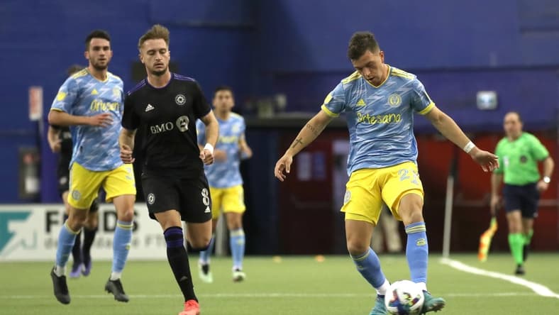Mar 5, 2022; Montreal, Quebec, CAN; Philadelphia Union defender Kai Wagner (27) plays the ball against CF Montr  al during the first half at Olympic Stadium. Mandatory Credit: Jean-Yves Ahern-USA TODAY Sports