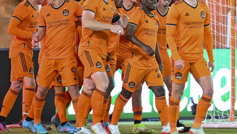 Mar 12, 2022; Houston, Texas, USA; Houston Dynamo FC forward Darwin Quintero (23) celebrates with teammates after his second goal of the match against the Vancouver Whitecaps at PNC Stadium. Mandatory Credit: Maria Lysaker-USA TODAY Sports