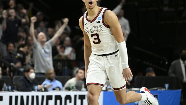 Mar 19, 2022; Portland, OR, USA; Gonzaga Bulldogs guard Andrew Nembhard (3) reacts to a play against Memphis Tigers during the second half in the second round of the 2022 NCAA Tournament at Moda Center. Mandatory Credit: Troy Wayrynen-USA TODAY Sports