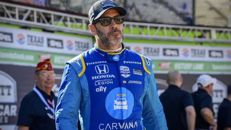 Mar 20, 2022; Fort Worth, Texas, USA; Chip Ganassi Racing driver Jimmie Johnson (48) of United States is introduced before the start of the NTT IndyCar Series XPEL 375 race at Texas Motor Speedway. Mandatory Credit: Jerome Miron-USA TODAY Sports