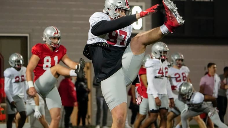 Ohio State Buckeyes defensive lineman Noah Potter (97) stretches during a spring football practice at the Woody Hayes Athletics Center in Columbus on March 22, 2022.

Ncaa Football Ohio State Spring Practice