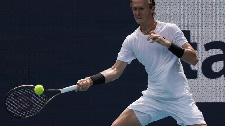 Mar 24, 2022; Miami Gardens, FL, USA; Sebastian Korda (USA) hits a forehand against Alejandro Davidovich Fokina (ESP) (not pictured) in a first round men's singles match in the Miami Open at Hard Rock Stadium. Mandatory Credit: Geoff Burke-USA TODAY Sports