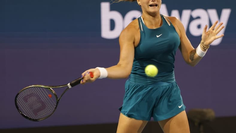 Mar 24, 2022; Miami Gardens, FL, USA; Aryna Sabalenka hits a forehand against Irina-Camelia Begu (ROU) (not pictured) in a second round women's singles match in the Miami Open at Hard Rock Stadium. Mandatory Credit: Geoff Burke-USA TODAY Sports