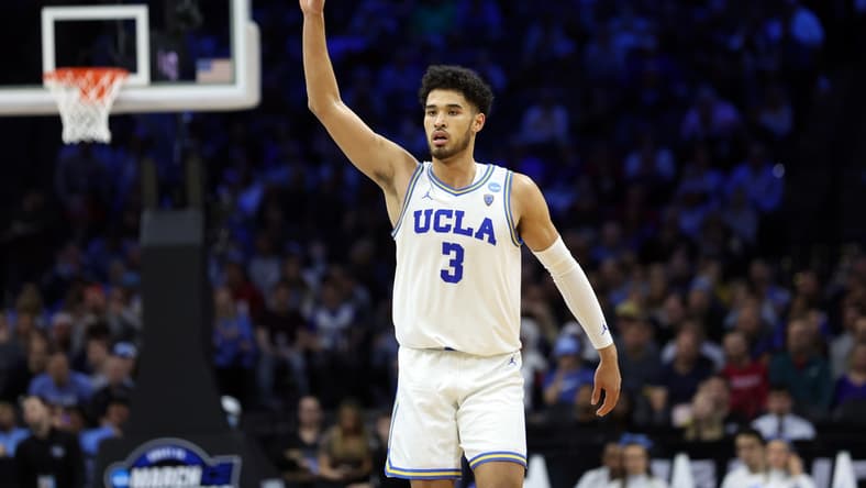 Mar 25, 2022; Philadelphia, PA, USA; UCLA Bruins guard Johnny Juzang (3) reacts after a three point shot in the second half against the North Carolina Tar Heels in the semifinals of the East regional of the men's college basketball NCAA Tournament at Wells Fargo Center. Mandatory Credit: Bill Streicher-USA TODAY Sports