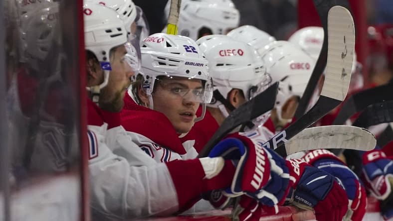 Mar 31, 2022; Raleigh, North Carolina, USA;  Montreal Canadiens right wing Cole Caufield (22) looks on against the Carolina Hurricanes during the second period at PNC Arena. Mandatory Credit: James Guillory-USA TODAY Sports