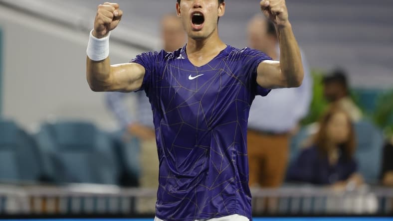 Apr 1, 2022; Miami Gardens, FL, USA; Carlos Alcaraz (ESP) salutes the crowd after his match against Hubert Hurkacz (POL)(not pictured) in a men's singles semifinal in the Miami Open at Hard Rock Stadium. Mandatory Credit: Geoff Burke-USA TODAY Sports