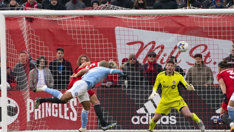 Apr 2, 2022; Toronto, Ontario, CAN; New York City forward H  ber (9) scores a goal on Toronto FC goalkeeper Alex Bono (25) during the second half at BMO Field. Mandatory Credit: Nick Turchiaro-USA TODAY Sports
