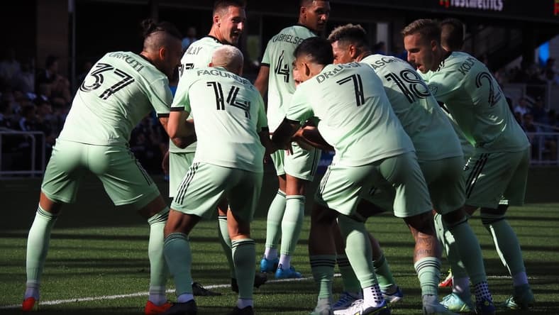 Apr 2, 2022; San Jose, California, USA; Austin FC forward Maximiliano Urruti (37) celebrates with teammates after scoring a goal against the San Jose Earthquakes during the first half at PayPal Park. Mandatory Credit: Kelley L Cox-USA TODAY Sports