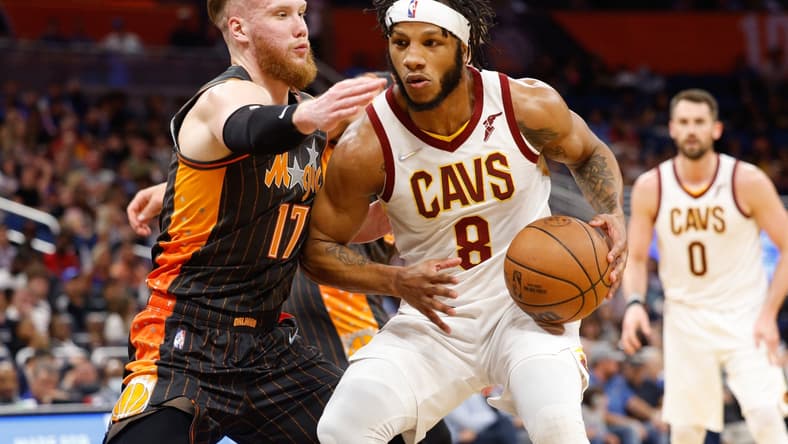 Apr 5, 2022; Orlando, Florida, USA; Cleveland Cavaliers forward Lamar Stevens (8) drives to the basket guarded by Orlando Magic forward Ignas Brazdeikis (17) in the first half at Amway Center. Mandatory Credit: Nathan Ray Seebeck-USA TODAY Sports