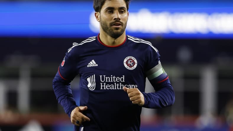 Apr 2, 2022; Foxborough, Massachusetts, USA; New England Revolution midfielder Carles Gil (10) during the first half against the New York Red Bulls at Gillette Stadium. Mandatory Credit: Winslow Townson-USA TODAY Sports