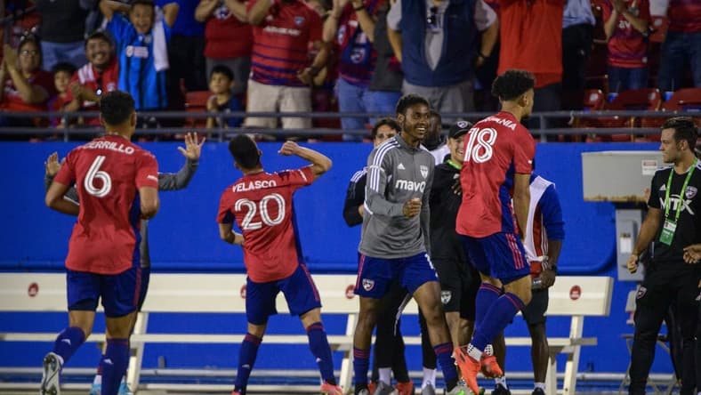 Apr 9, 2022; Frisco, Texas, USA; FC Dallas midfielder Edwin Cerrillo (6) and forward Alan Velasco (20) and midfielder Brandon Servania (18) celebrate the goal scored by Servania against the Colorado Rapids during the first half at Toyota Stadium. Mandatory Credit: Jerome Miron-USA TODAY Sports