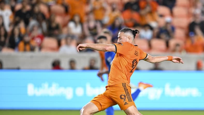 Apr 9, 2022; Houston, Texas, USA; Houston Dynamo forward Sebastian Ferreira (9) kicks the ball against San Jose Earthquakes at PNC Stadium. Mandatory Credit: Maria Lysaker-USA TODAY Sports