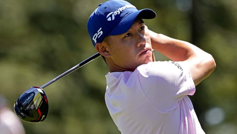 Apr 10, 2022; Augusta, Georgia, USA; Collin Morikawa plays his shot from the third tee during the final round of the Masters golf tournament. Mandatory Credit: Michael Madrid-USA TODAY Sports