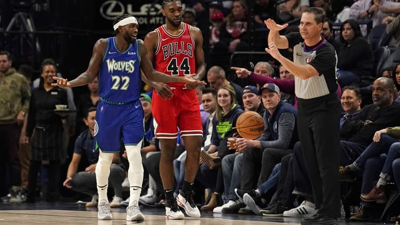 Apr 10, 2022; Minneapolis, Minnesota, USA;  NBA referee David Guthrie (16) calls a technical foul on Minnesota Timberwolves guard Patrick Beverley (22) for questioning an out-of-bounds call during the second quarter. He was then ejected from the game as it was his second technical of the night against the Chicago Bulls at Target Center. Mandatory Credit: Nick Wosika-USA TODAY Sports