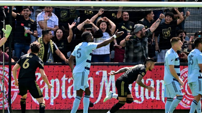 Apr 17, 2022; Los Angeles, California, USA;   Fans celebrate after a goal by Los Angeles FC forward Cristian Arango (9) in the first half of the game against the Sporting Kansas City at Banc of California Stadium. Mandatory Credit: Jayne Kamin-Oncea-USA TODAY Sports